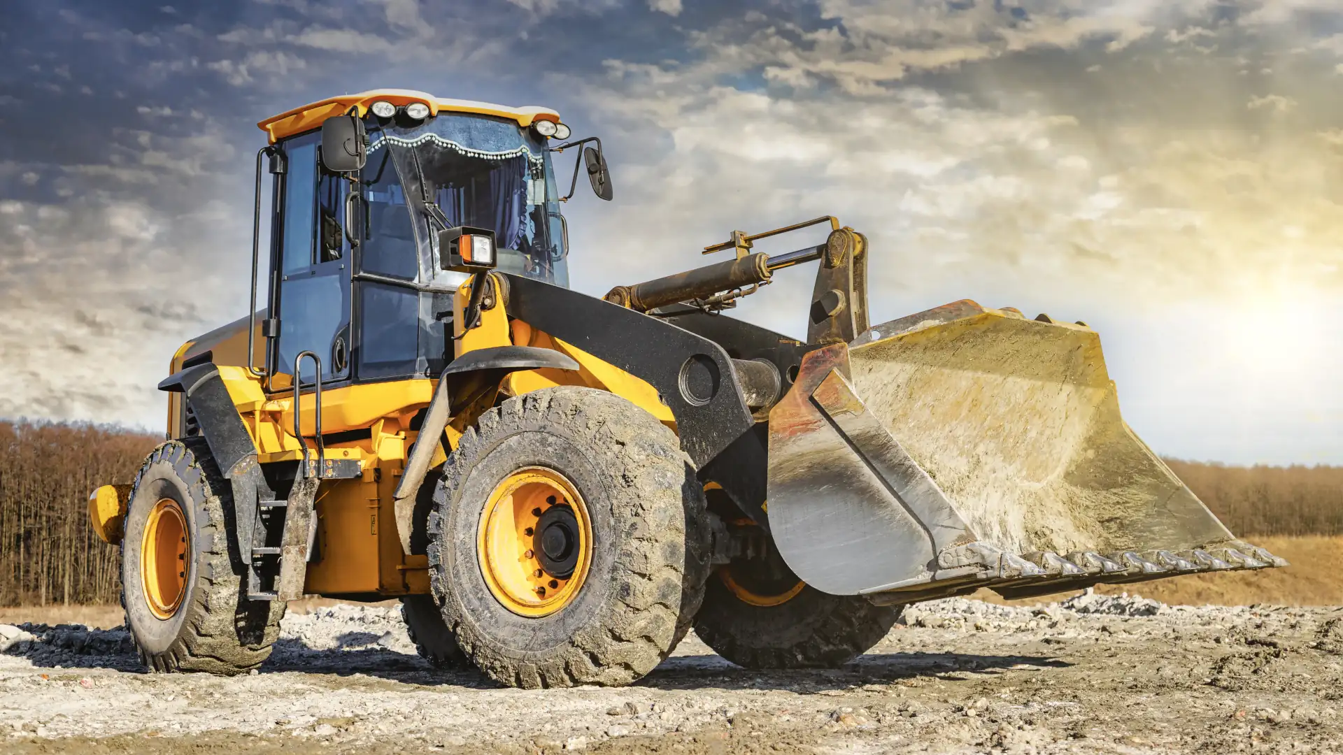 اللوادر والجرافات